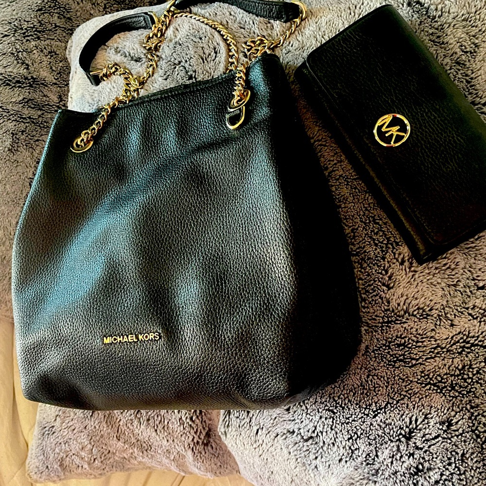 Michael Kors used purse and wallet.